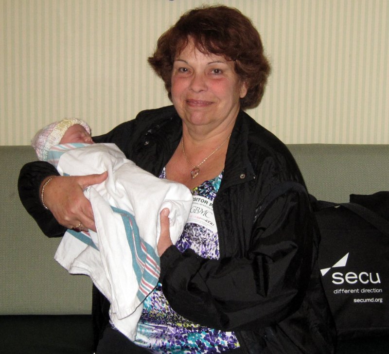Camille holds Julia